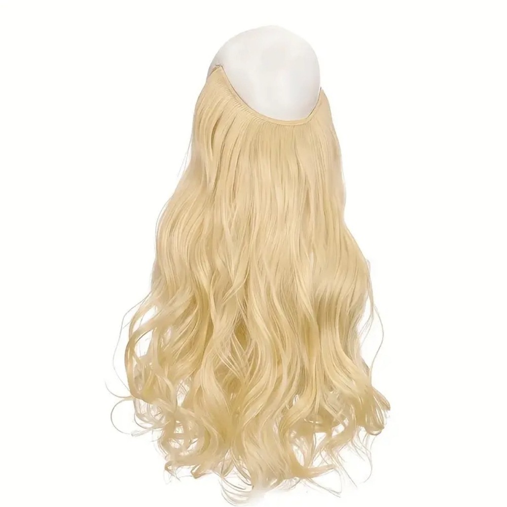 Pale blonde hair extension with elastic cord. Curly 18 inches long synthetic